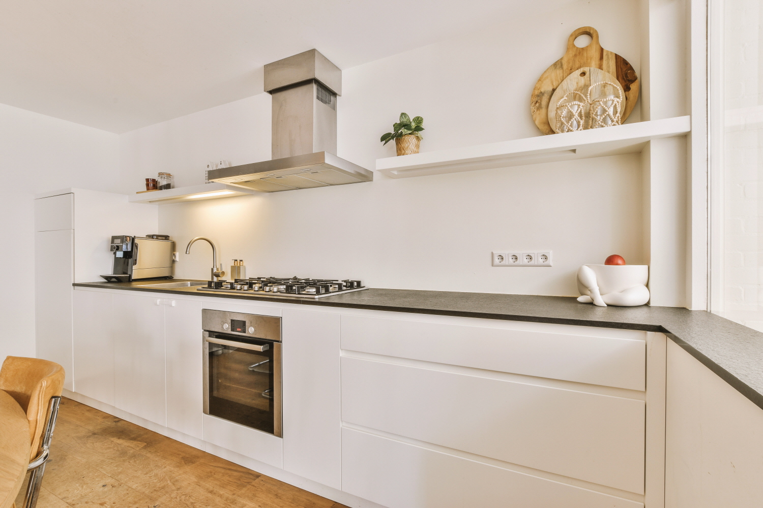 Install open shelving in your kitchen for a modern, spacious look.