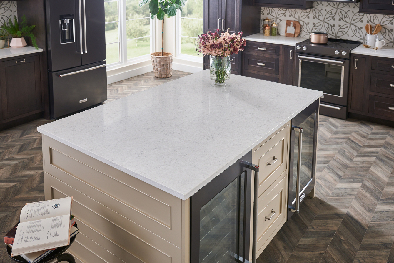 LX Hausys VIATERA - A storage-equipped kitchen island maximizes small kitchen functionality with style.
