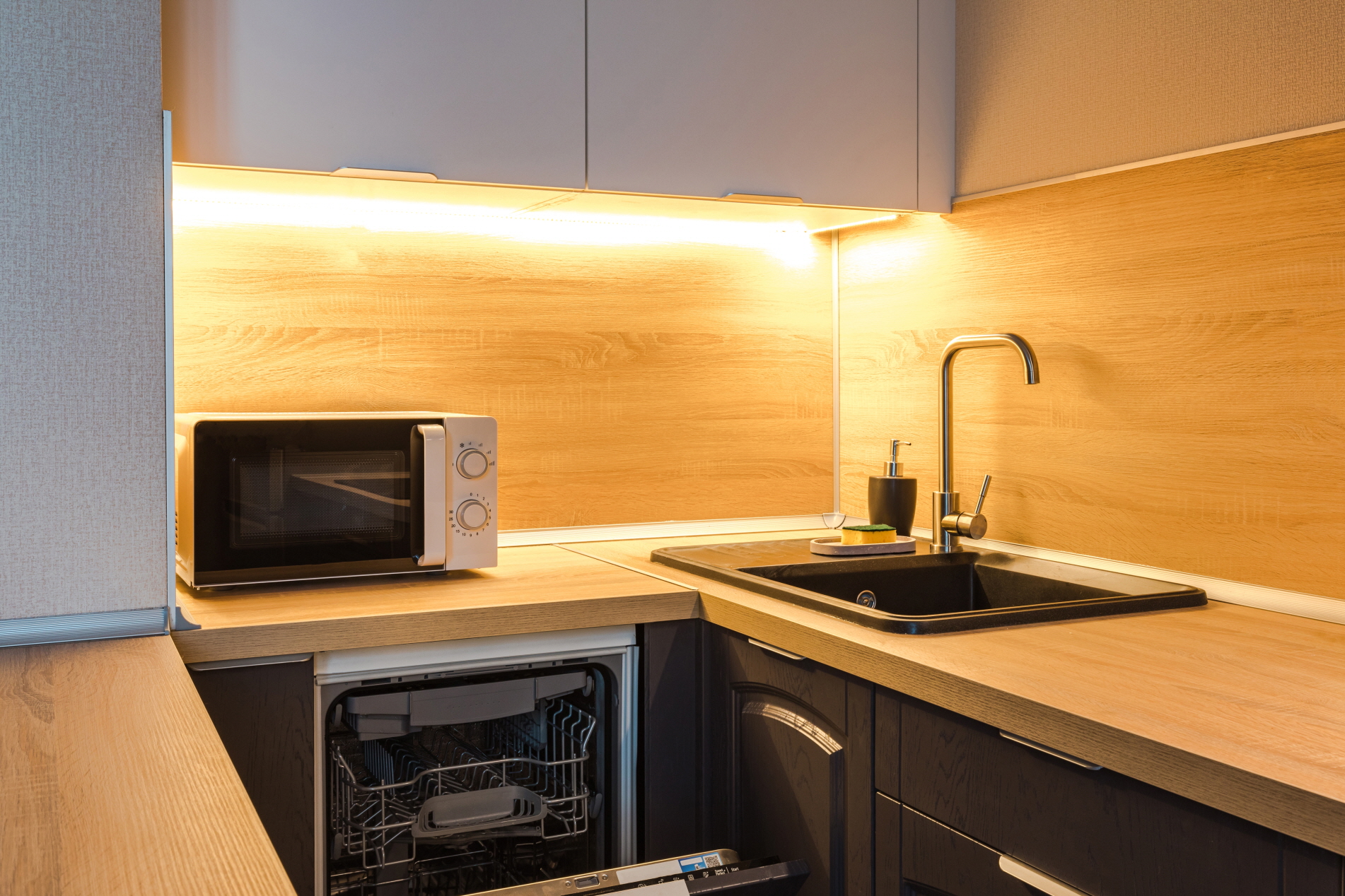 Maximizing space with compact appliances is essential in a small kitchen.
