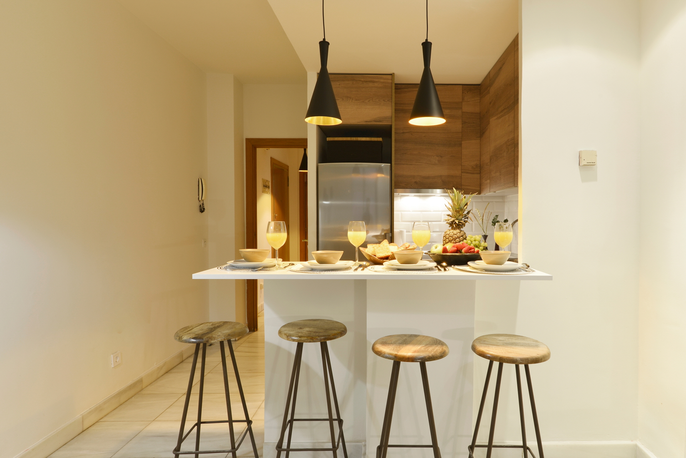 Transform your kitchen into a social gathering space by adding a breakfast bar.